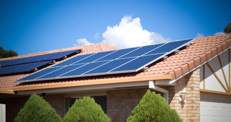 Solar panels on suburban house roof