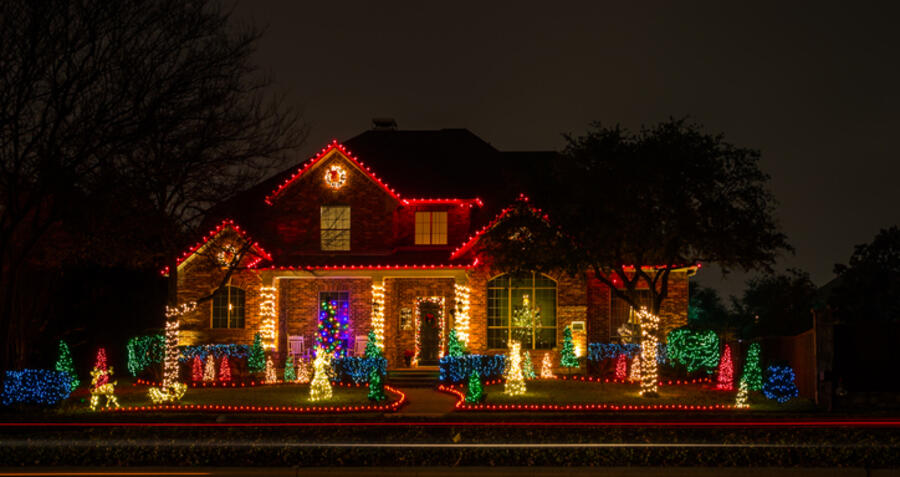 House decorated with Christmas lights at night
