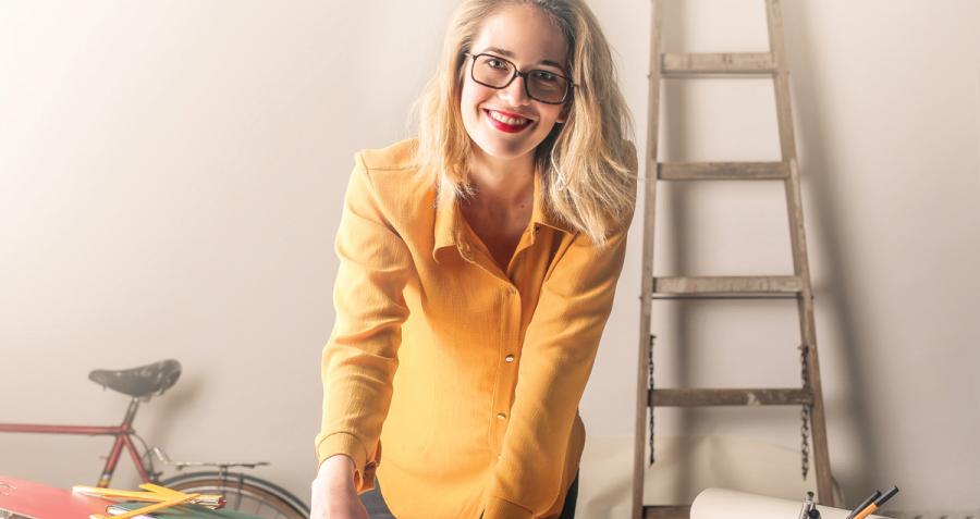 Young woman at work desk