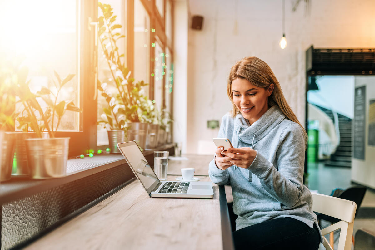 woman-using-mobile-app-at-home